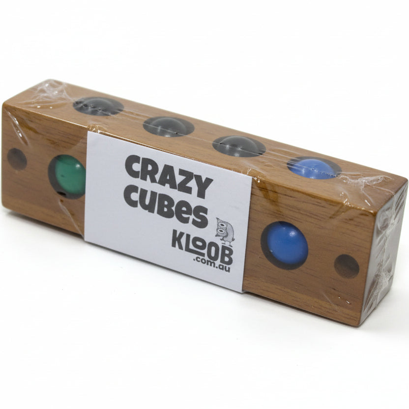 Wooden puzzle in shrink wrap with label saying 'Crazy Cubes' on a plain background