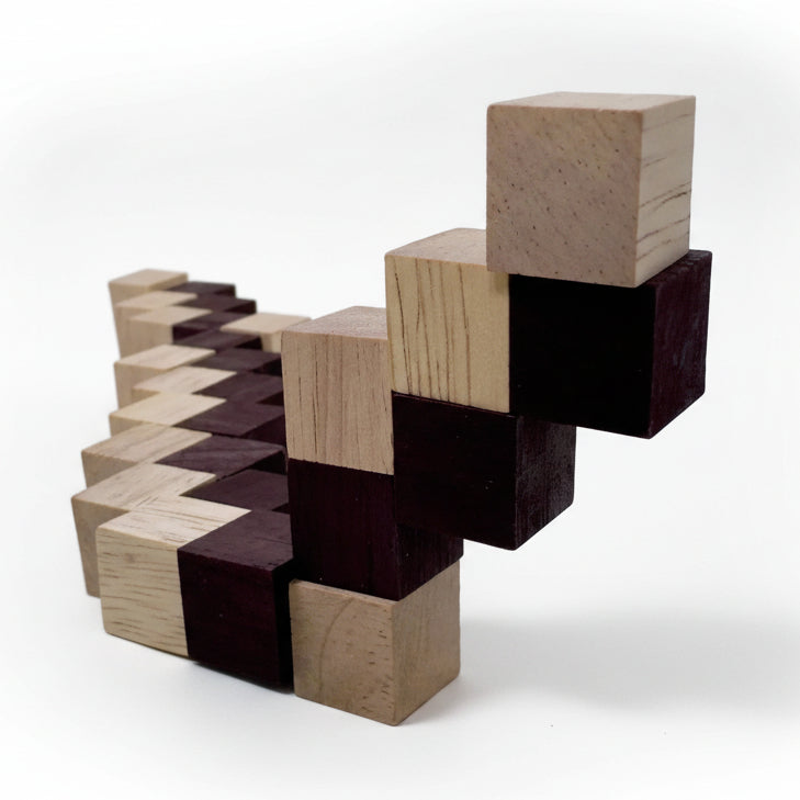 Wooden puzzle made of connected blocks on a white background