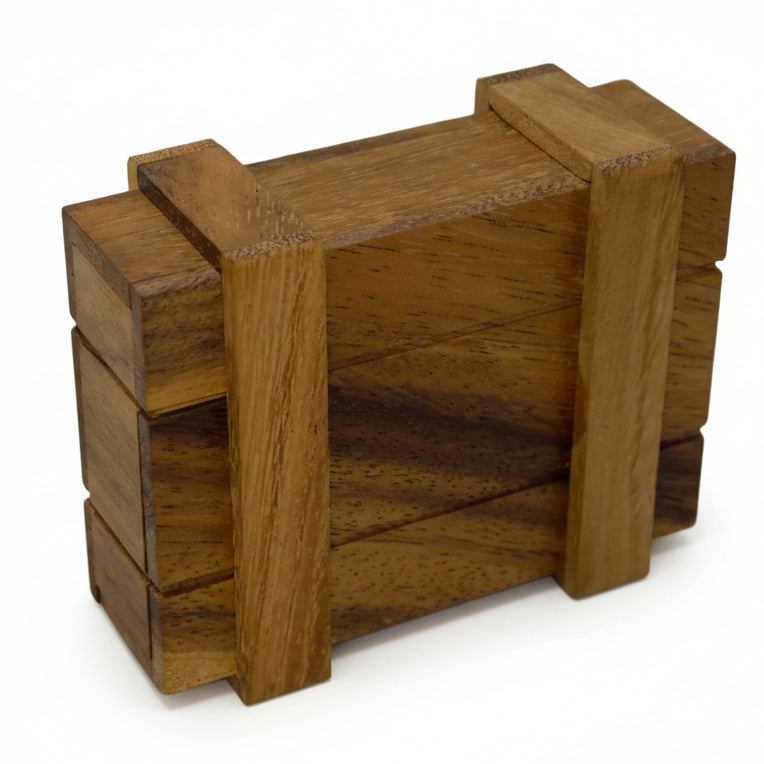 Wooden puzzle cube on a plain background